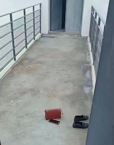 A sanitation worker in Shenzhen left her shoes and personal belongings before jumping from the roof of her workplace